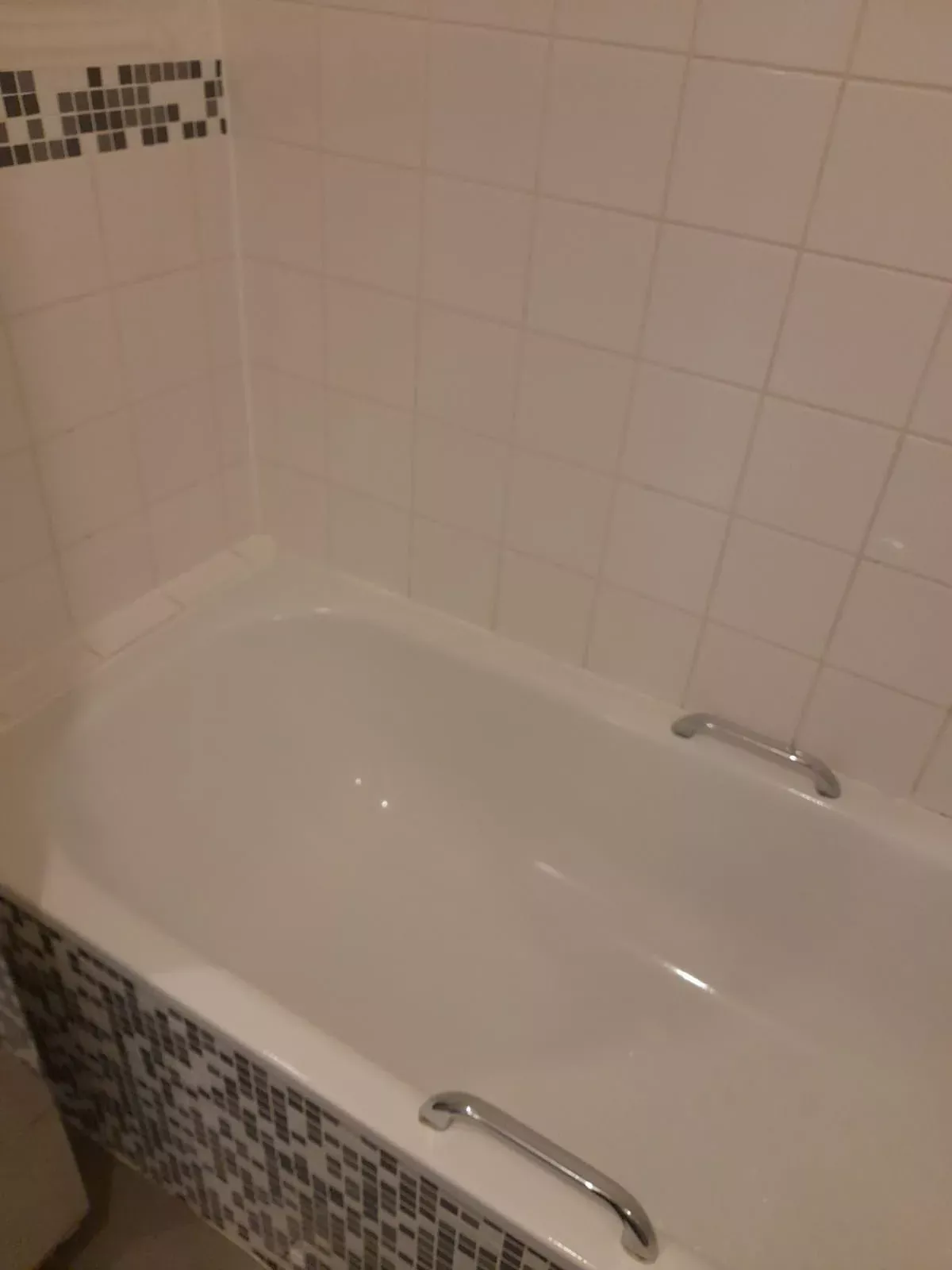 Bathtub and tile surround scrubbed clean