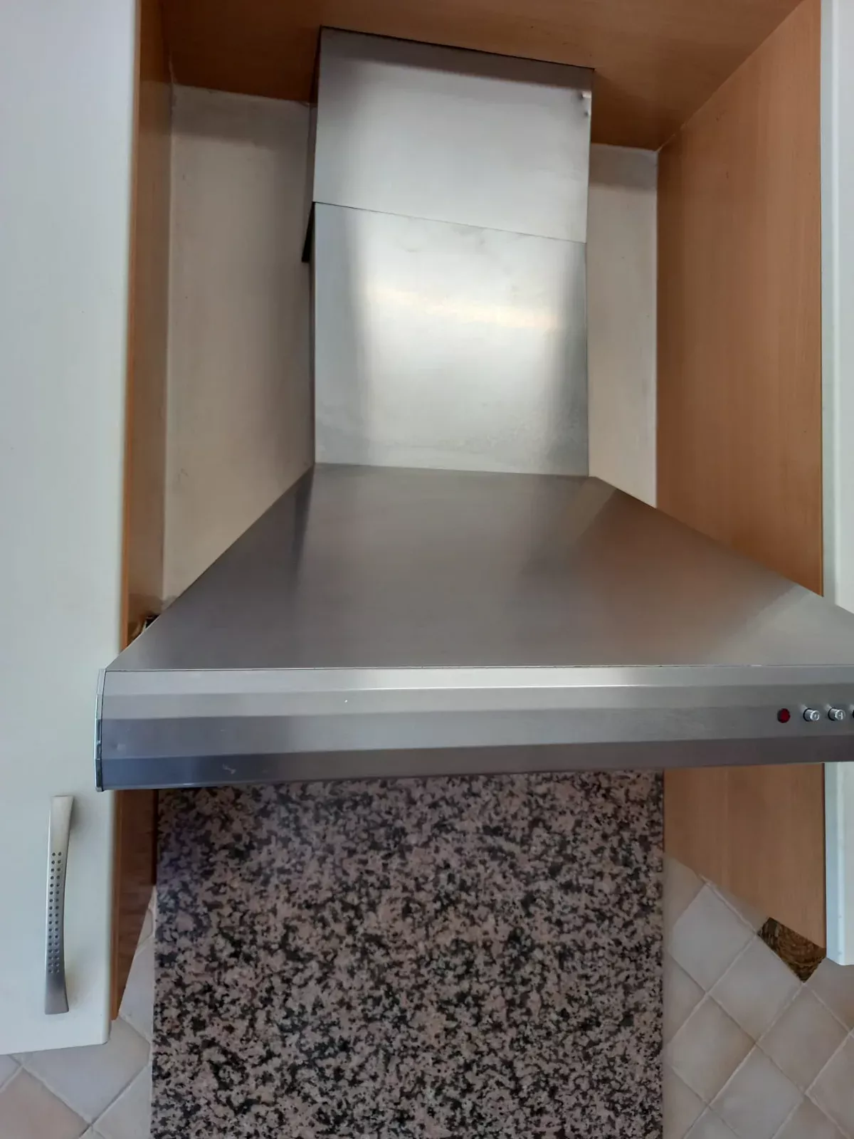 Stainless range hood degreased and wiped down